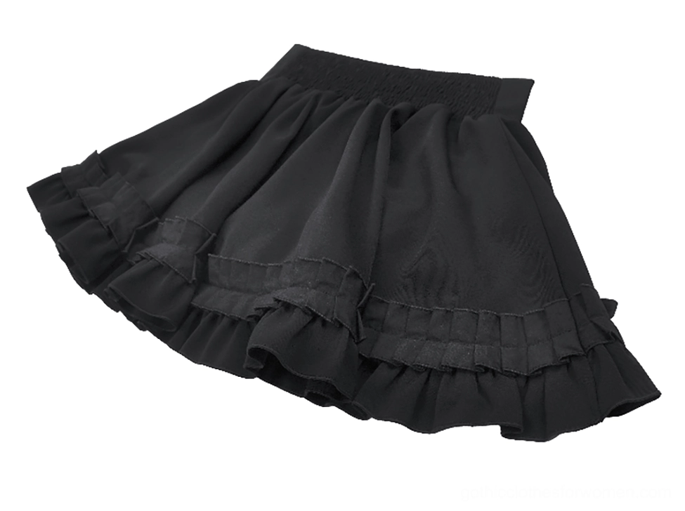 Black gothic ruffle mini skirt low-angle tilted side view showing elastic smocked waist and draped fabric