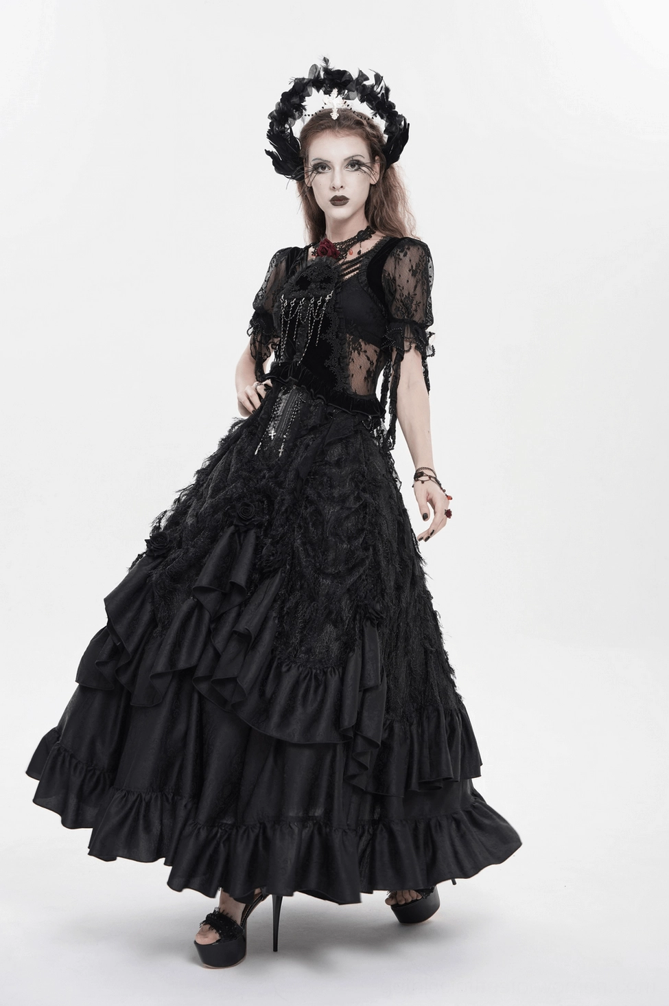 Black gothic ruffle maxi skirt dramatic angle view with cross embellishments and fuzzy details