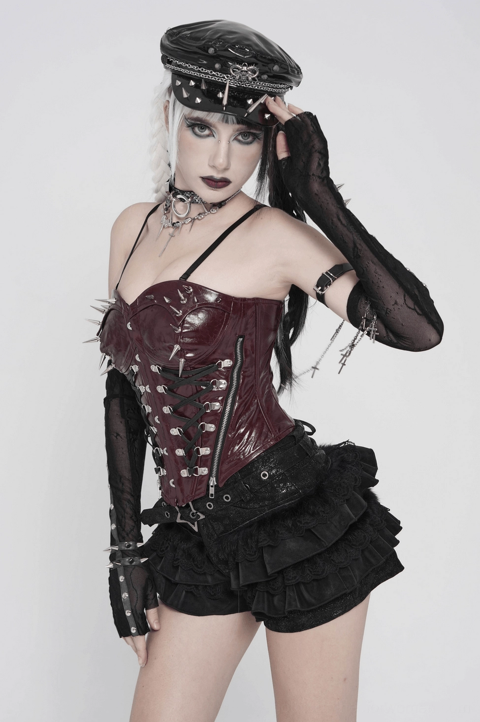 Black gothic ruffle skort mannequin display showing fitted silhouette and ruffle layers