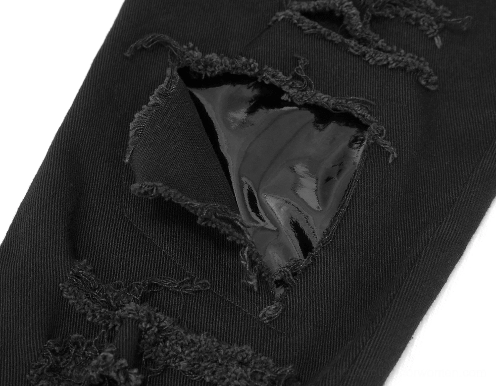 Black gothic skinny trousers with asymmetrical cut and ripped mesh panels, architectural silhouette view