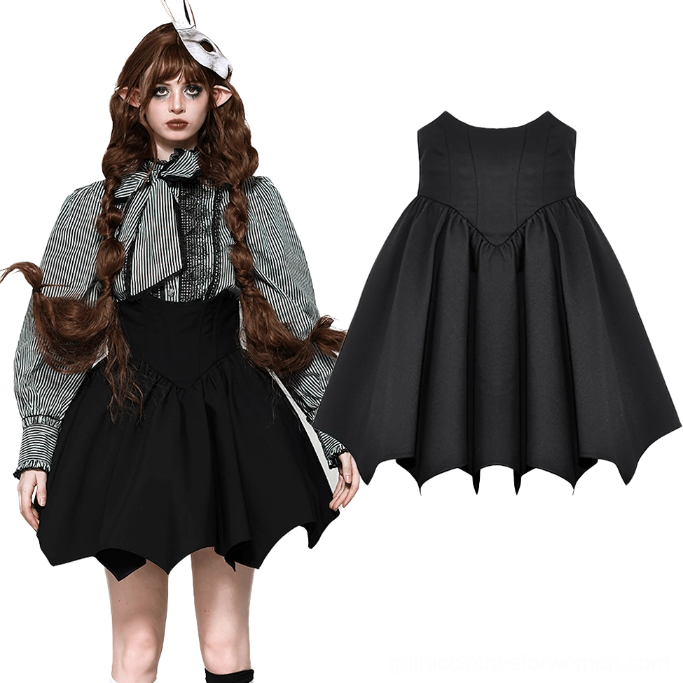 Black gothic skirt styled with striped shirt and elf model showing bat wing hem design