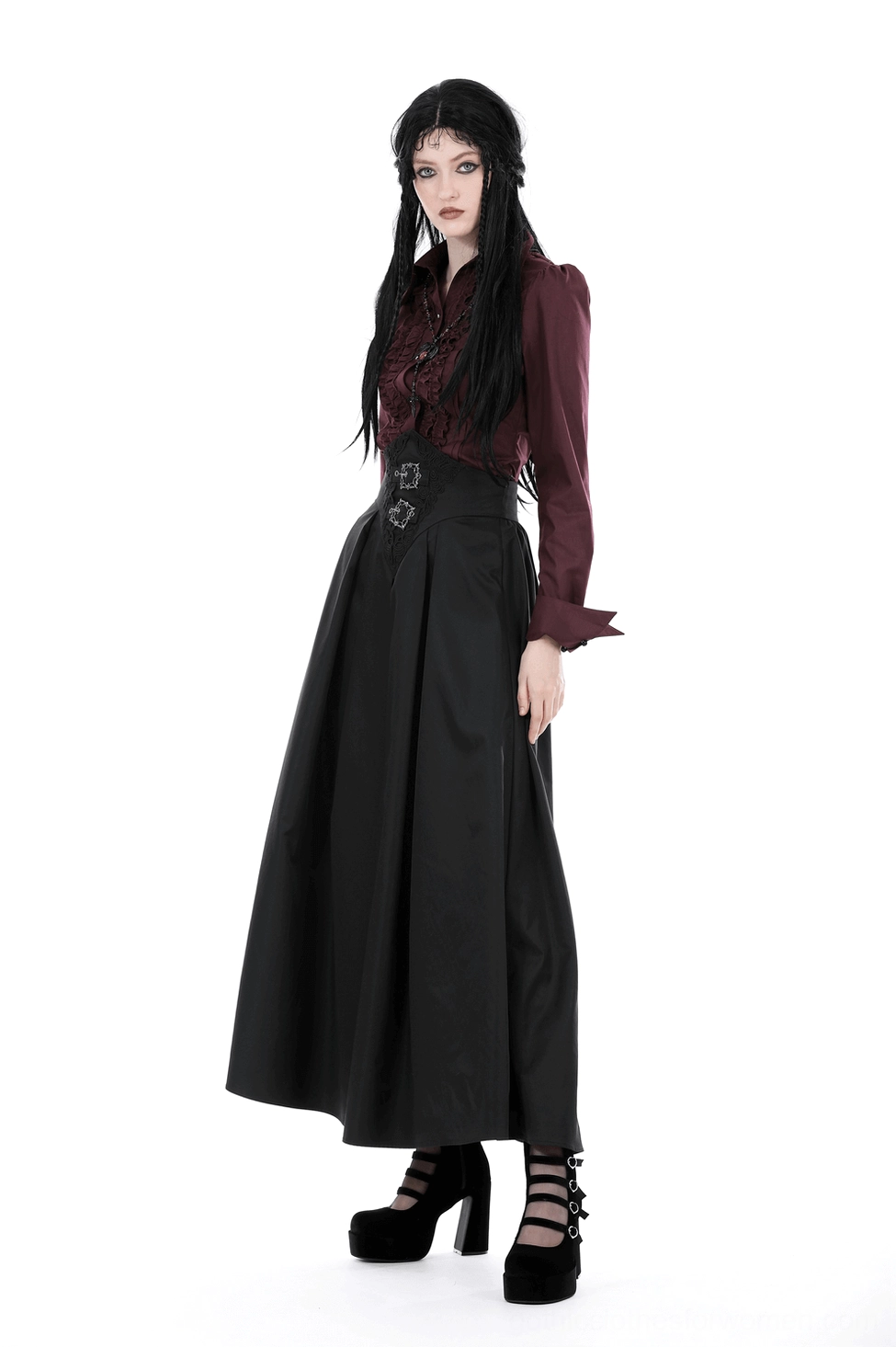 Black gothic skirt with visible lace corset waist detail and silver buckle embellishments on model