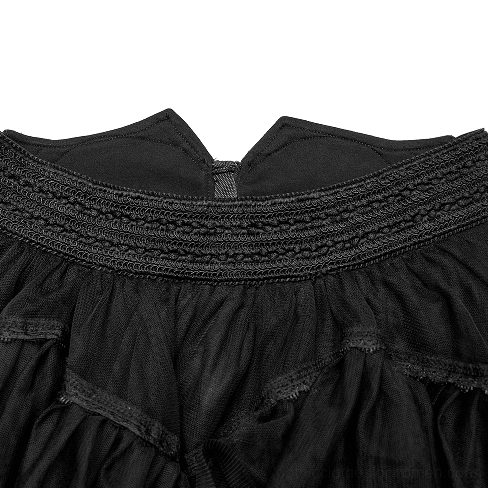 Close-up of black gothic tulle skirt waist elastic trim and precise stitching craftsmanship detail