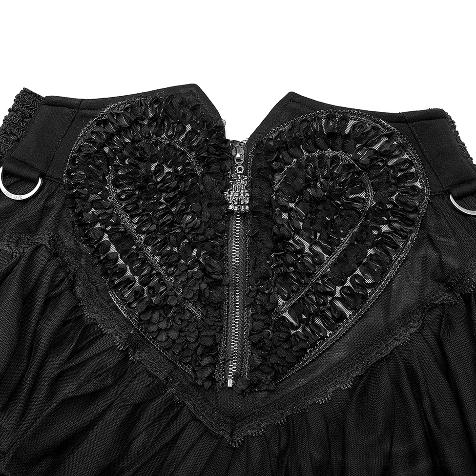 Close-up detail of black gothic skirt waistband with beaded heart applique and skeleton hand zipper