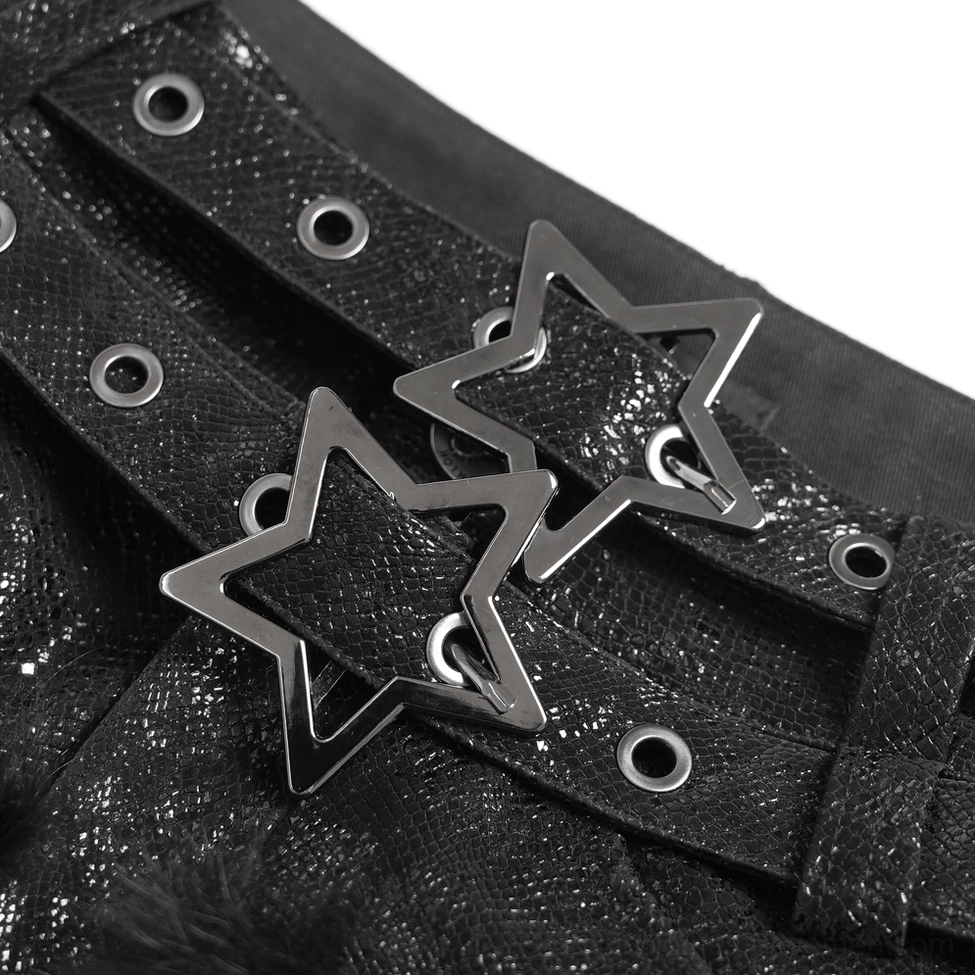 Extreme close-up of twin metal star buckles on black synthetic leather gothic skort belt