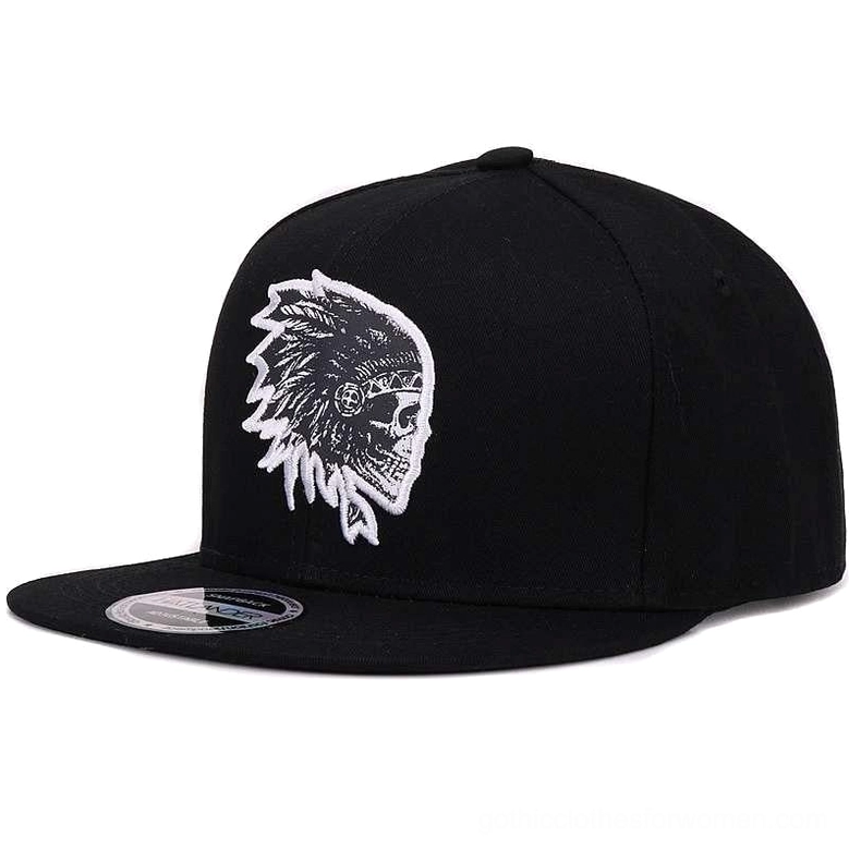Black flat brim snapback baseball cap with white embroidered skull logo side angle