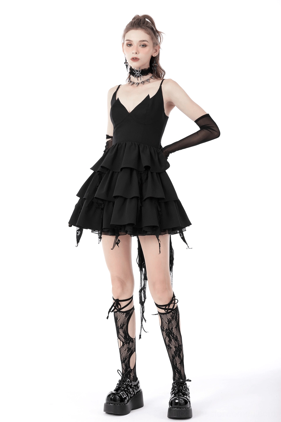 Black gothic mini slip dress with plunging neckline, layered lace ruffles, and lace-up back styling detail