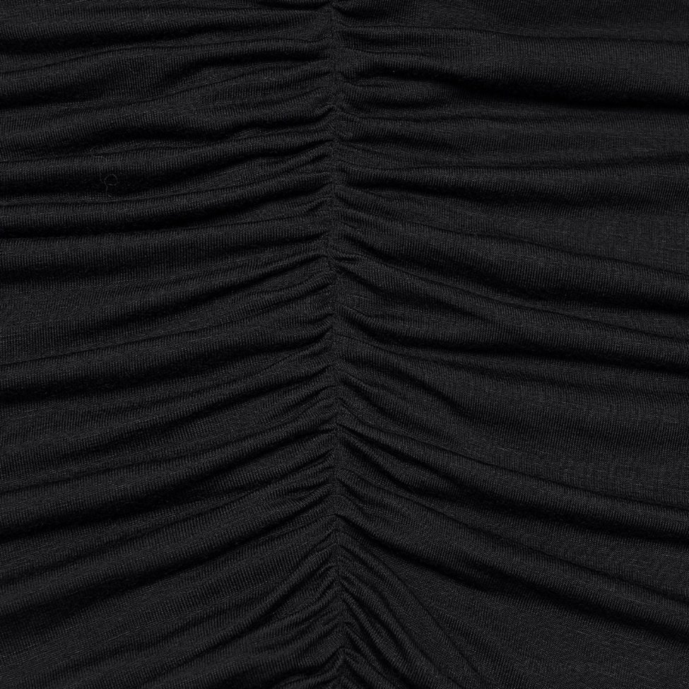 Fabric detail of black knitted bodycon slip dress showing vertical ruching and stretchy weave