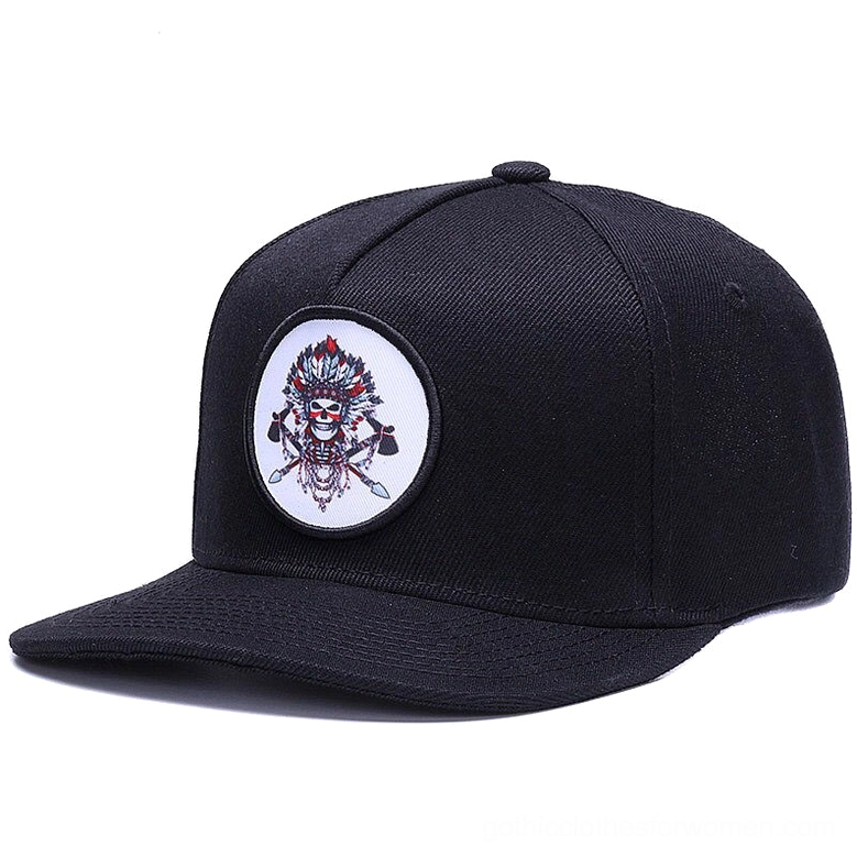 Black gothic snapback cap with embroidered round skull badge - front angle view for alternative fashion