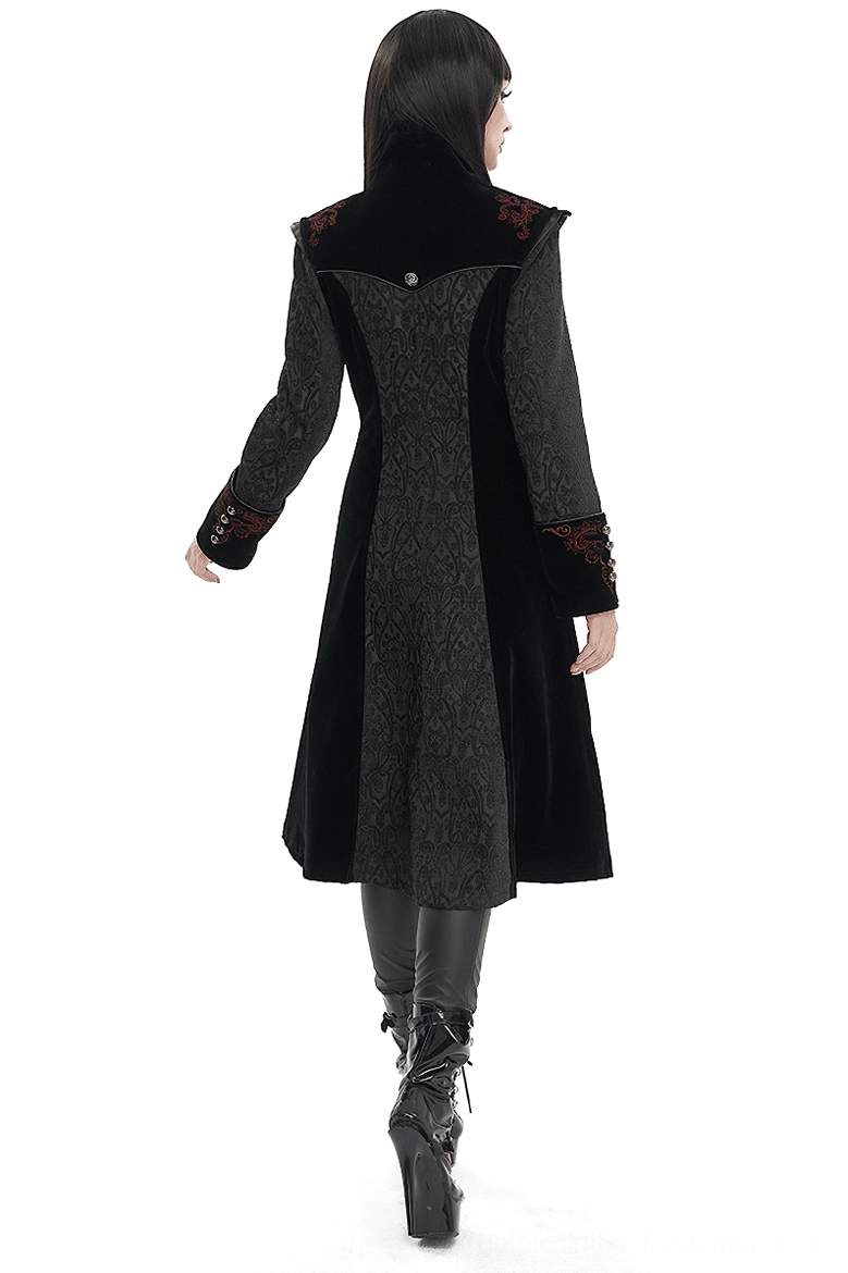 Black gothic stand collar coat back view on model, displaying fitted waist, split hem design, and full-length silhouette