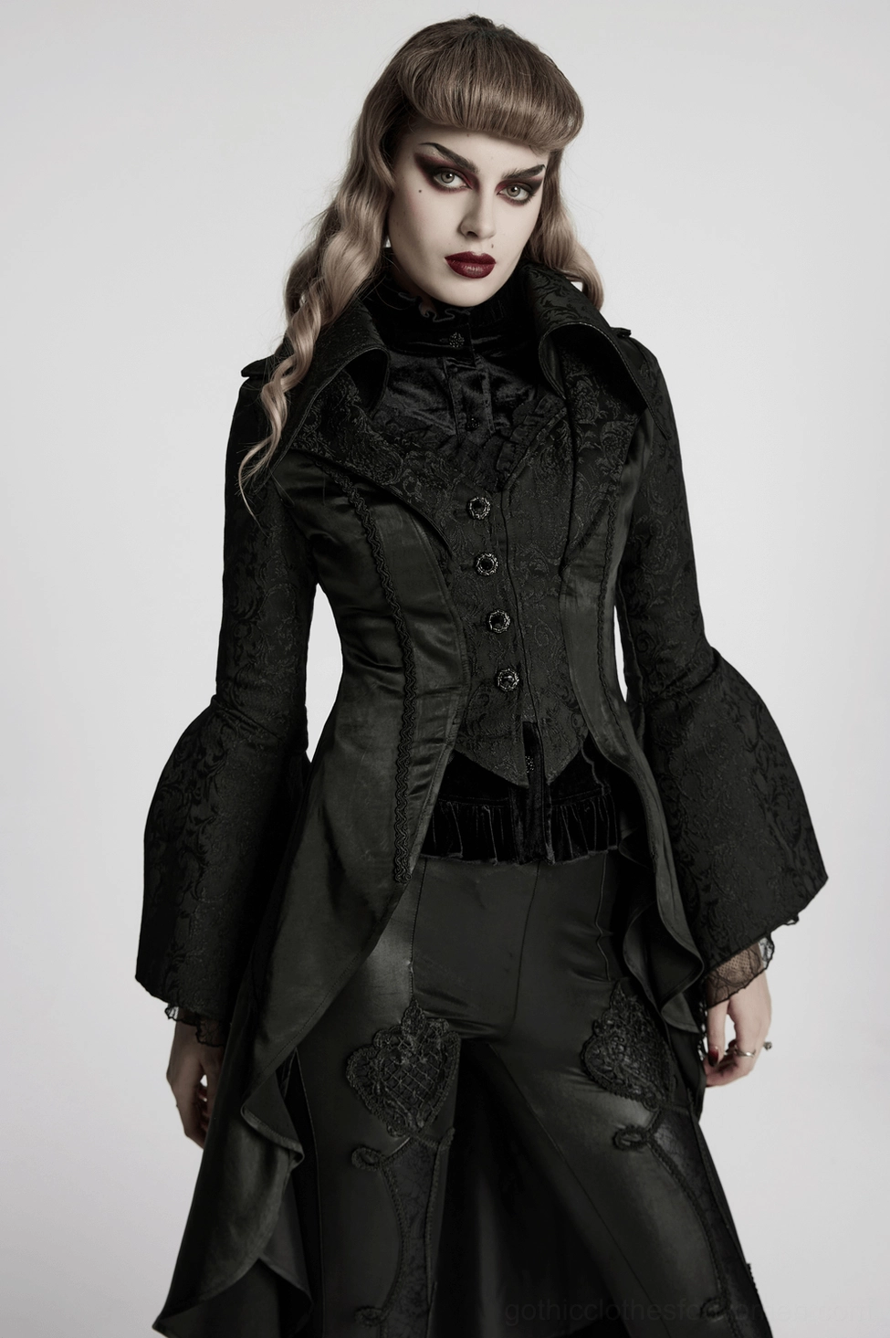 Women's black gothic tailcoat alternative fashion styled details