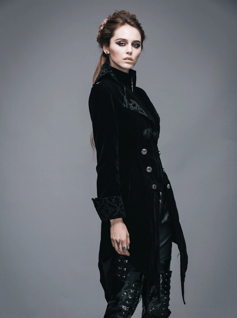 Black gothic velvet tailcoat back detail highlighting embroidered waist design and structural tailoring