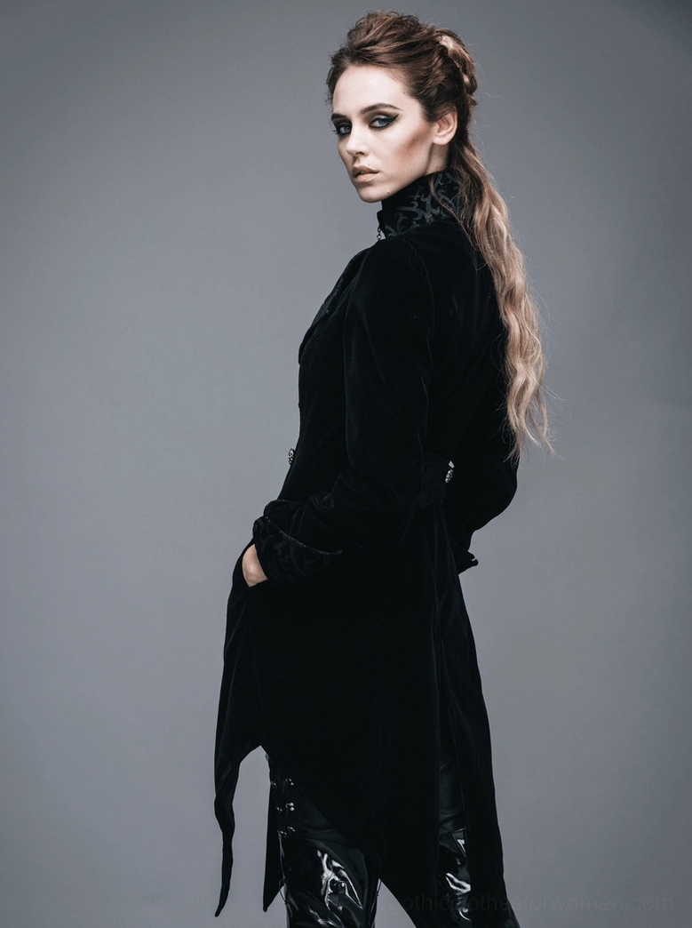 Right side profile of black gothic velvet tailcoat on mannequin displaying asymmetrical tail and sleeve details