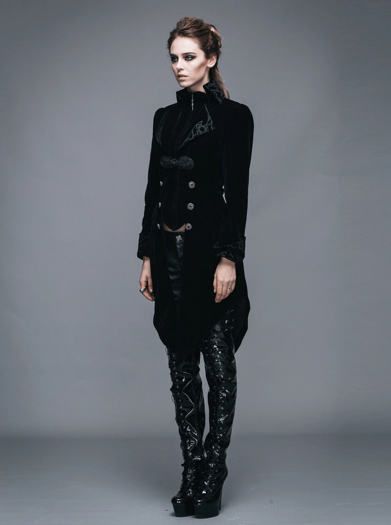Close-up of black gothic tailcoat sleeve and cuff showing embroidered detailing and velvet fabric quality
