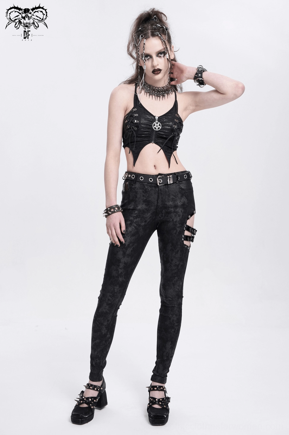 Black gothic trousers back view highlighting patent leather pockets and waist hardware