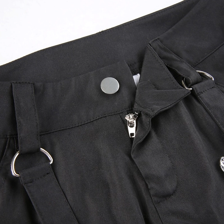 Black gothic cargo trousers displaying metal hardware, lace-up details and industrial design elements characteristic of goth fashion