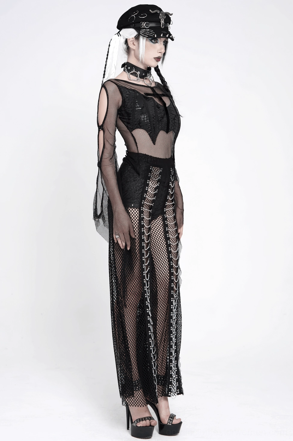 Side profile of black fishnet gothic trousers highlighting waist construction and leg opening width