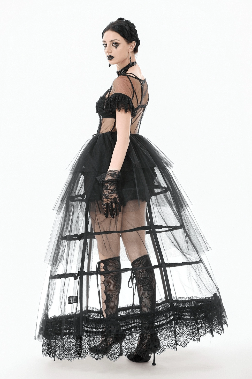 Full-length view of black gothic lace tulle dress highlighting overall silhouette and design elements
