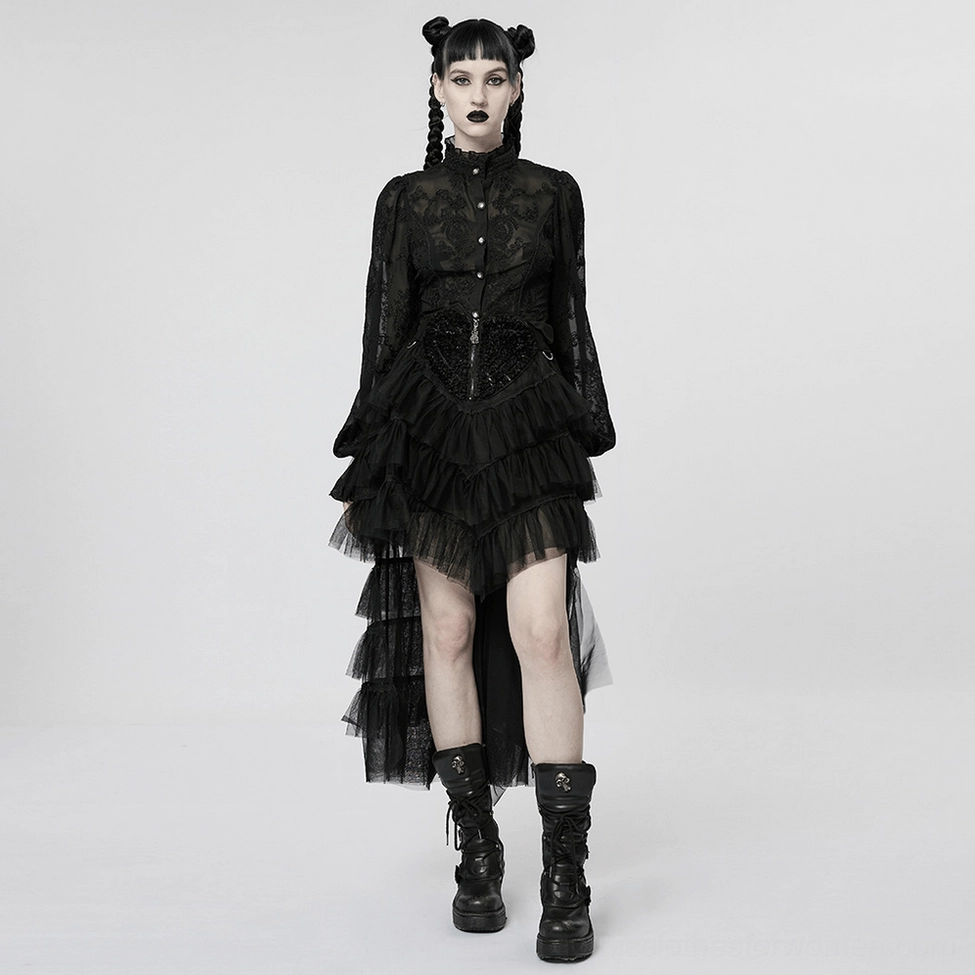 Black gothic tiered tulle skirt showing layered mesh construction and waistband elastic detail