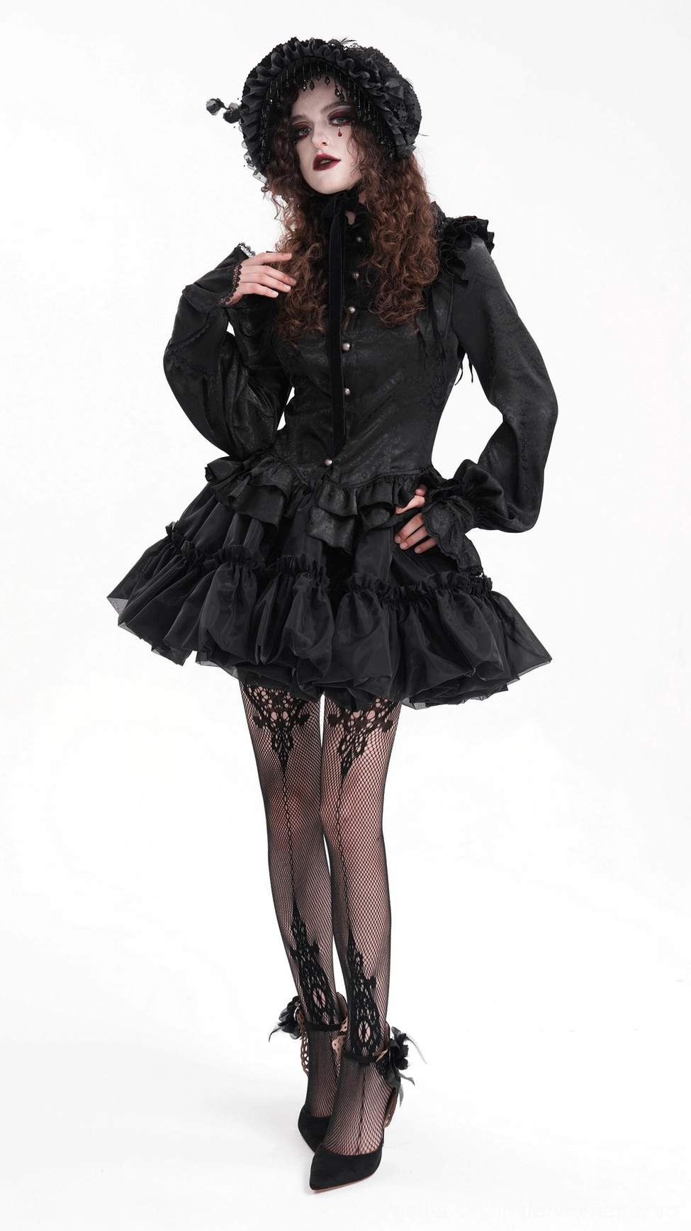Black layered gothic tulle skirt displaying intricate ruffle tiers and ethereal sheer tulle material composition