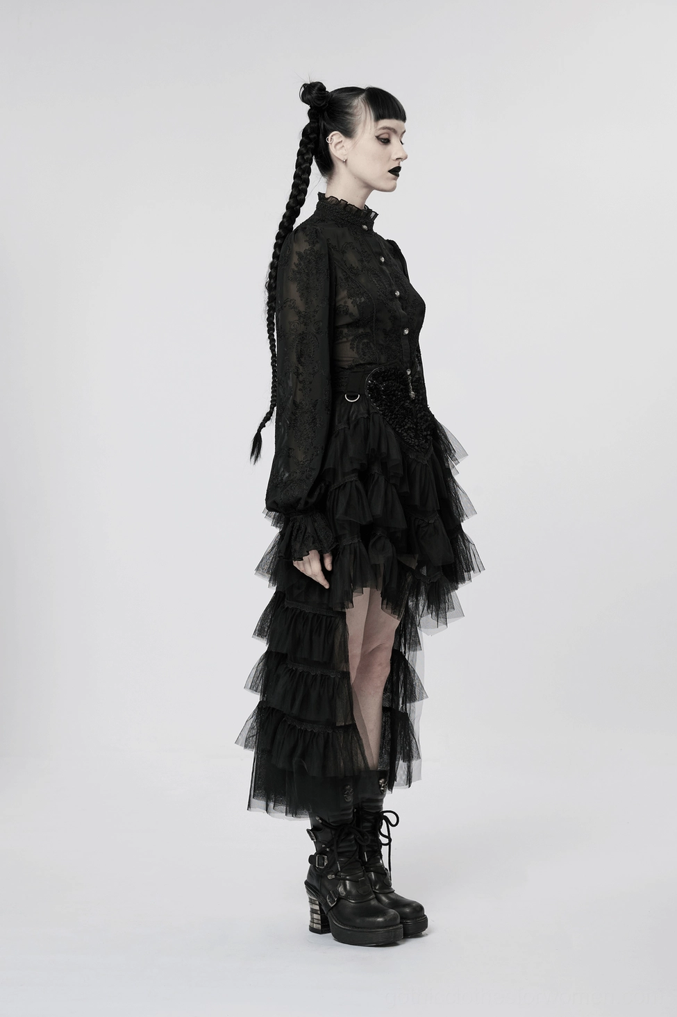 Black gothic tiered tulle ruffle skirt front view showing skeleton hand zipper and layered silhouette