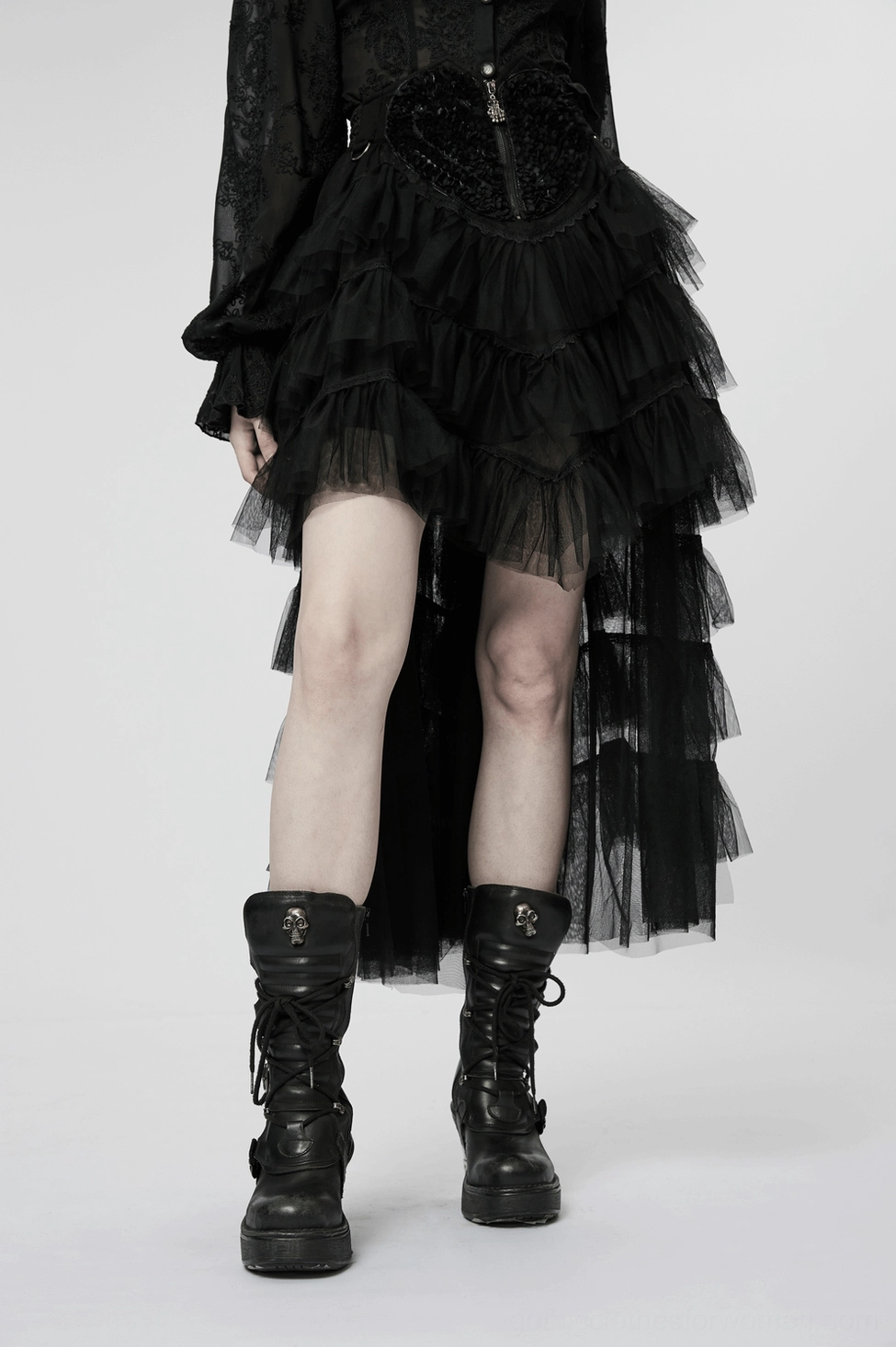 Black gothic tulle skirt detail showing skeleton hand zipper closure and tiered ruffle construction
