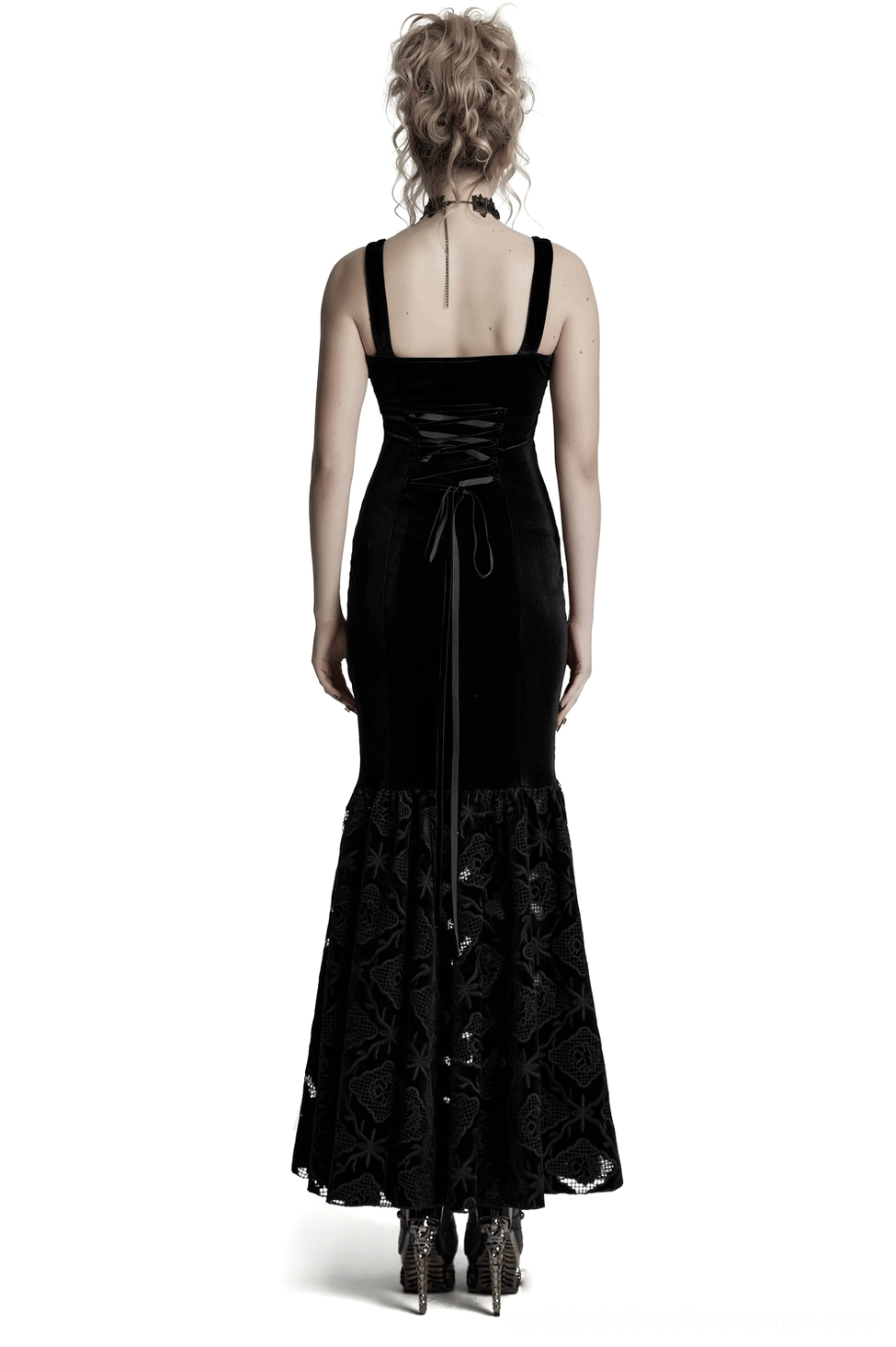 Back view of black gothic velvet dress with adjustable drawstring back closure and floral lace-trimmed pleated hem