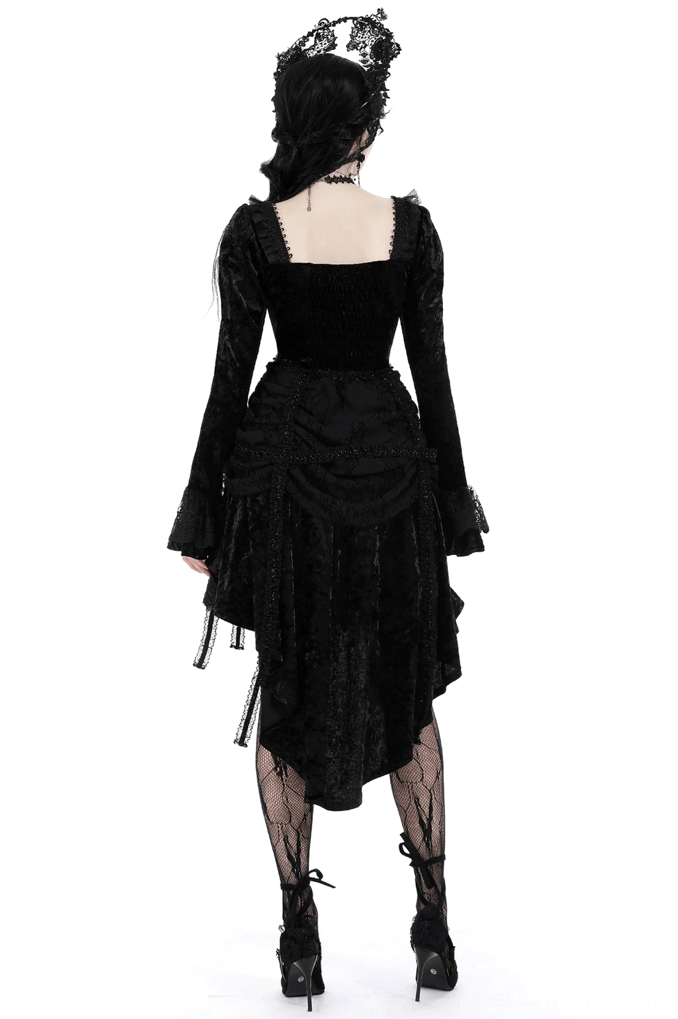 Black gothic velvet dress back view displaying shirred waist and layered ruffled high-low skirt design