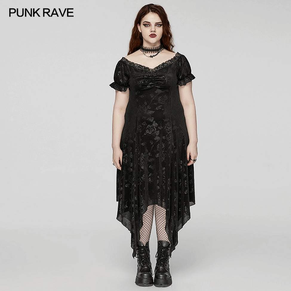 Black gothic asymmetrical velvet dress styled view showing overall silhouette with floral jacquard pattern and asymmetrical hem