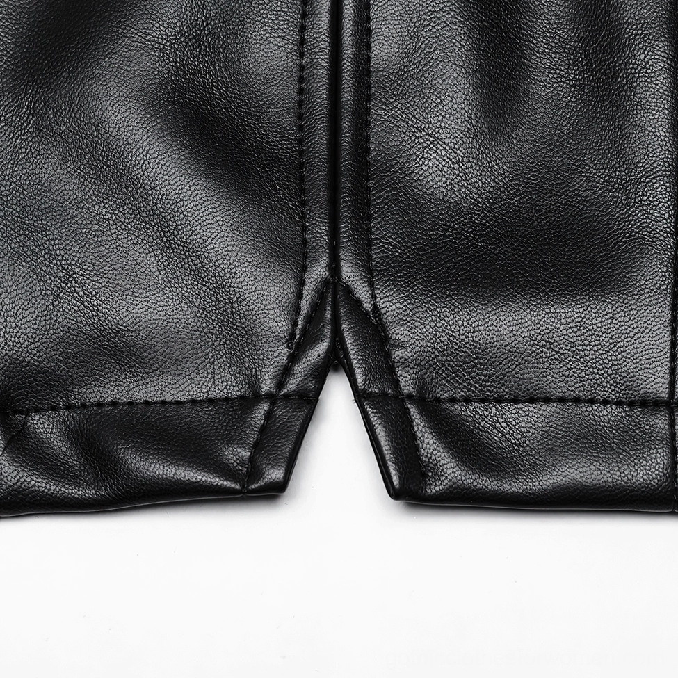Close-up of black gothic waistcoat inverted split hem showing neat tailored stitching and panel seams