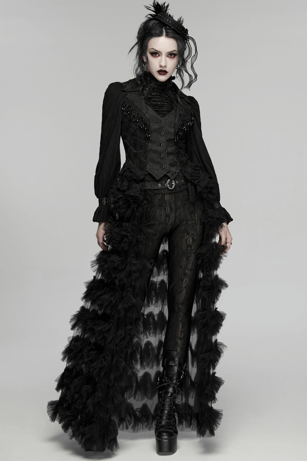 Black embroidered gothic waistcoat ruffled lace hem detail showing layered construction and drape