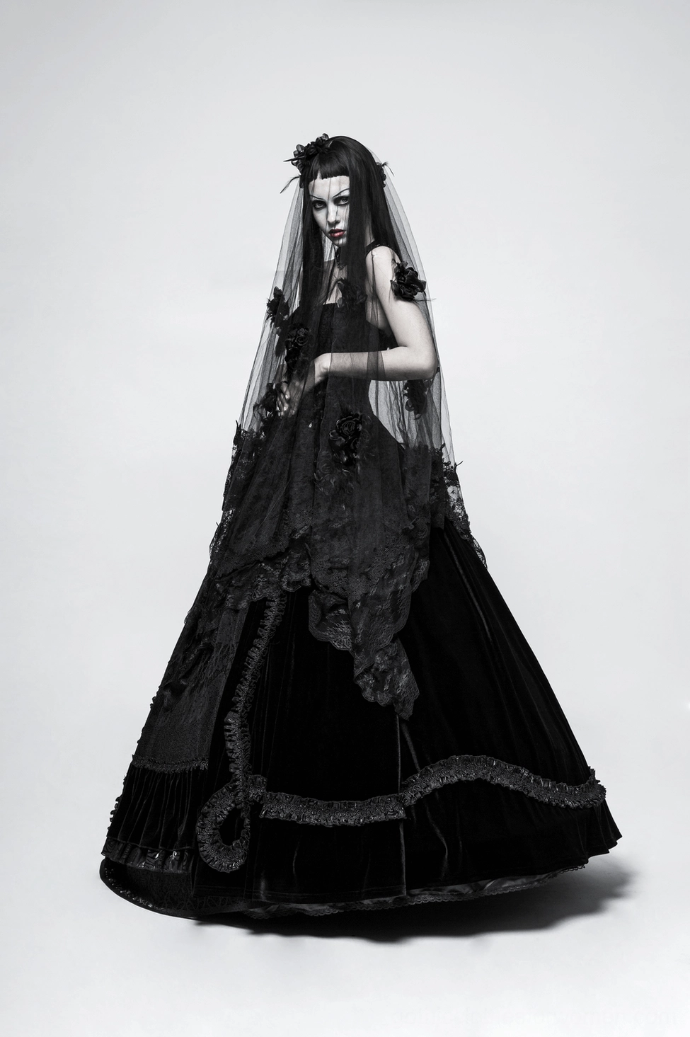 Full view of black gothic lace wedding veil showing dimensional rose embellishments and lace trim work