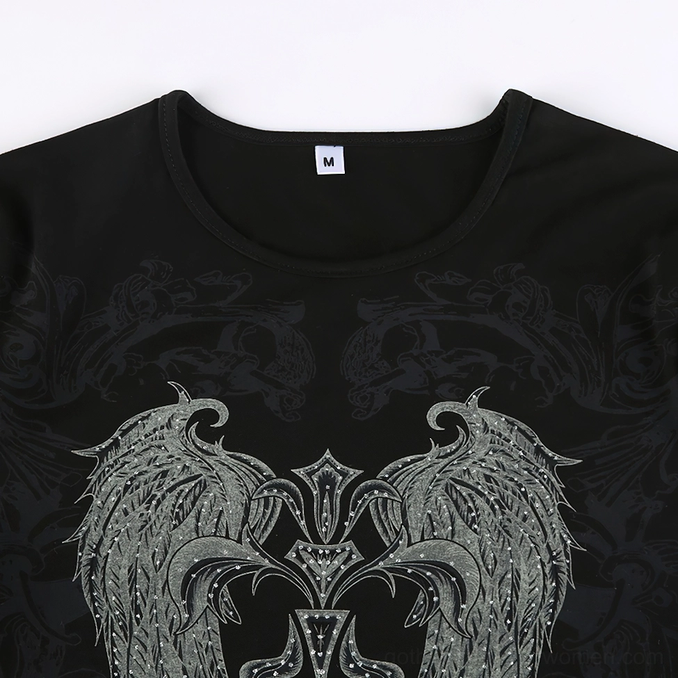 Flat lay close-up of black gothic wings crop top - crew neck detail with size M tag and rhinestone-embellished print texture