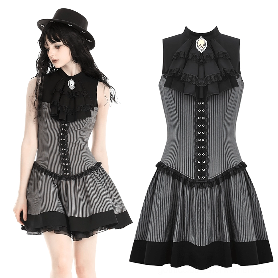 Three-quarter front view of black gray striped gothic ruffle dress showing sleeveless bodice and architectural ruffled skirt