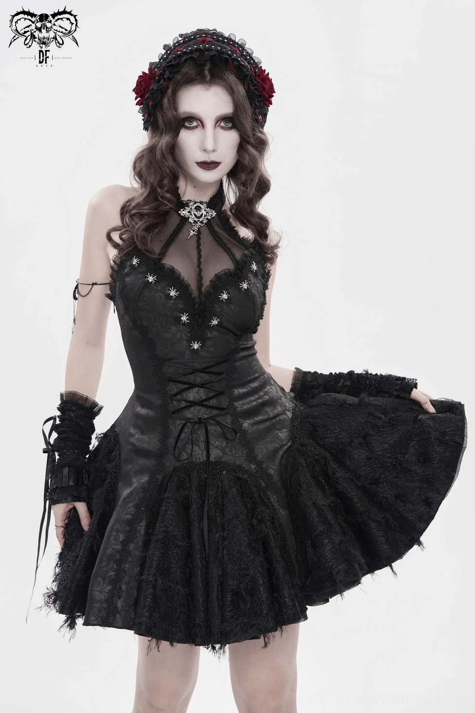 Black halter corset dress with lace panels and metal embellishments alternative fashion styling