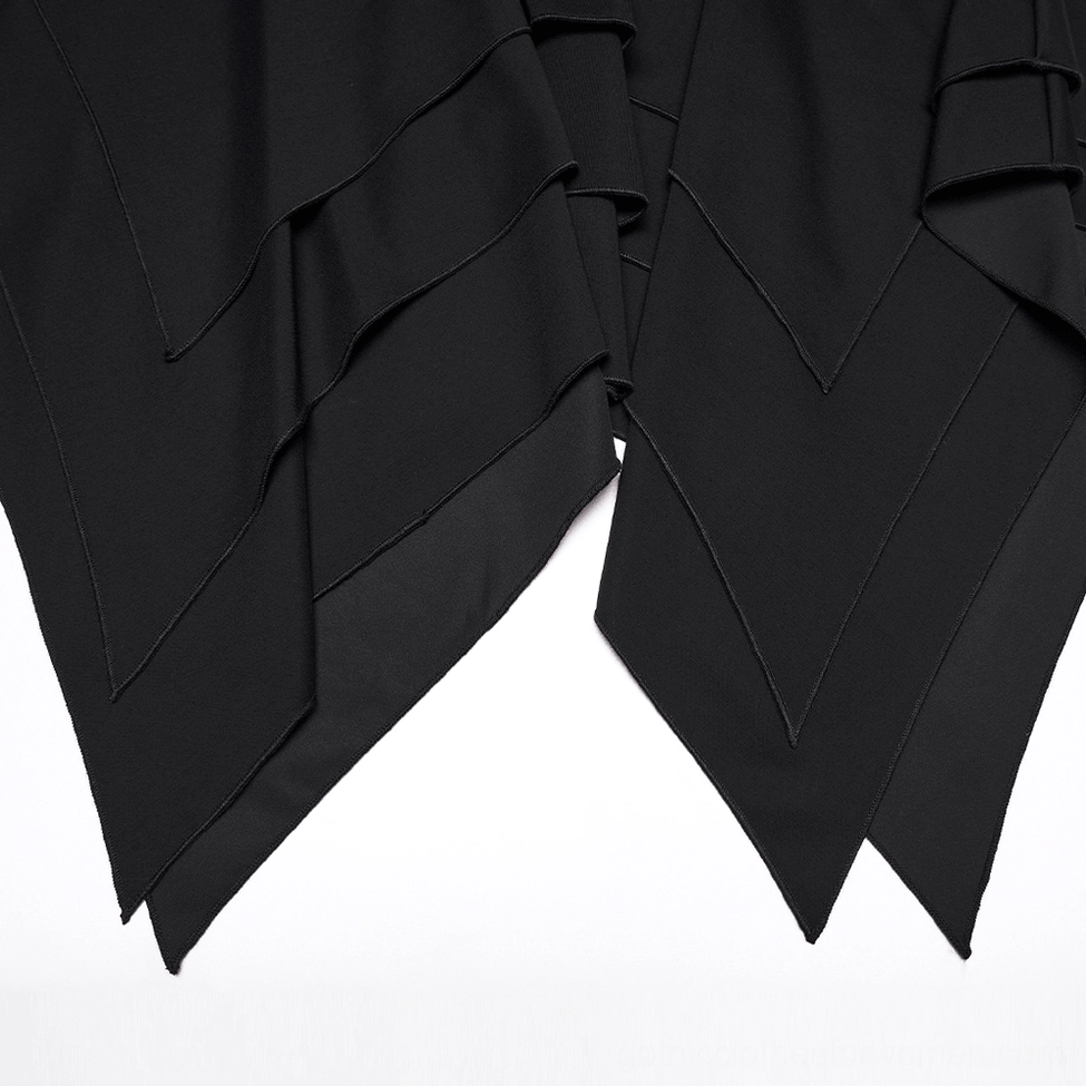 Close-up side view of multi-layered asymmetric handkerchief hem on gothic black mini dress