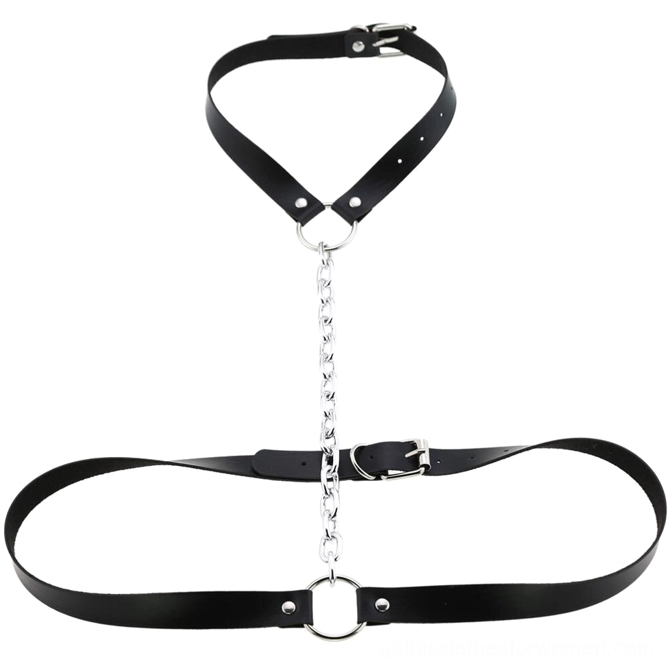 Black adjustable body harness flat lay with metal chain and O-ring connectors, gothic fashion accessory