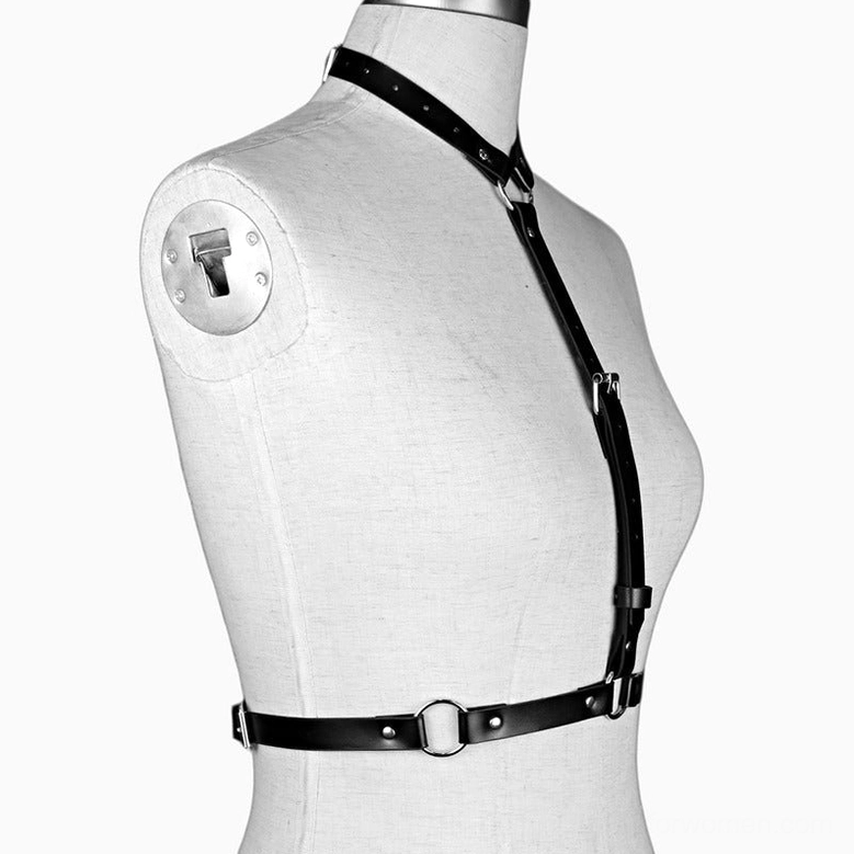 Black body harness showing single shoulder strap design displayed on mannequin, right front angle with pure white background