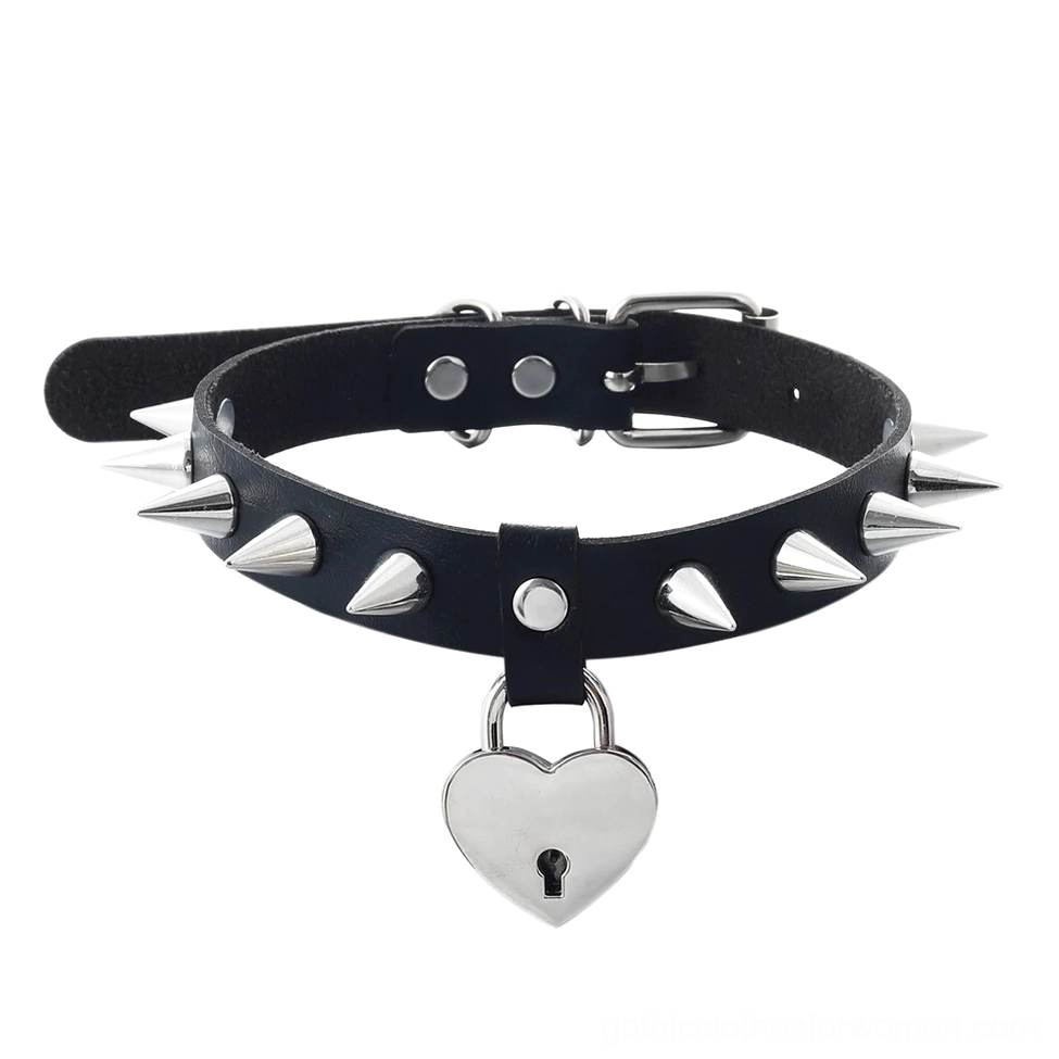Black heart spiked choker with silver padlock pendant and conical studs, front flat lay view showcasing gothic necklace design