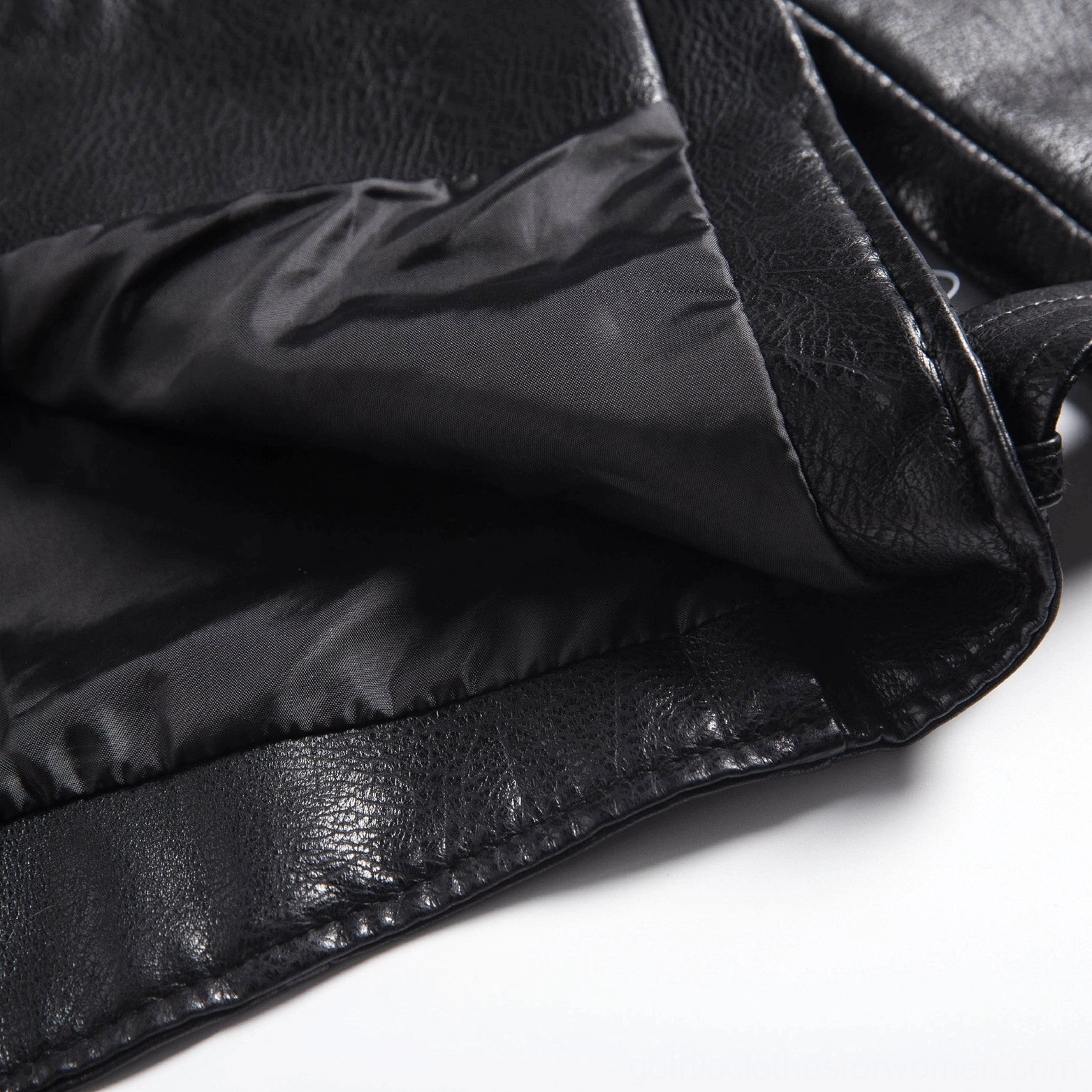 Back view black faux leather motorcycle jacket with DARE YOU prominent graphic and decorative design detail