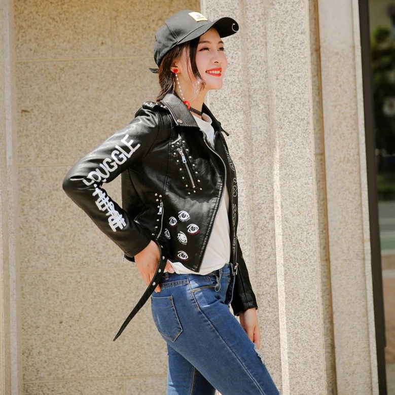 Side profile black faux leather jacket showing fitted cut sleeve length and overall proportional silhouette