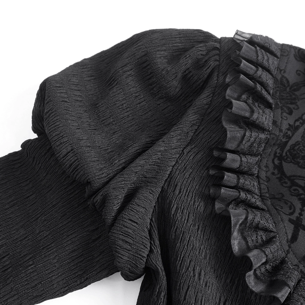 Black lace blouse sleeve detail showcasing flared bell sleeve design and lace fabric craftsmanship