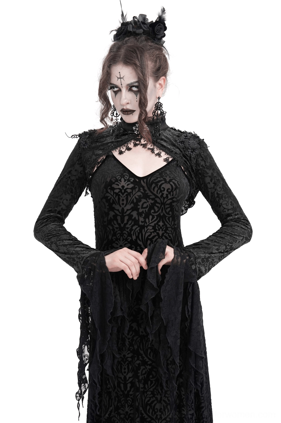 Black lace bolero with dramatic bell sleeves worn over velvet dress by gothic model, front view showcasing floral lace and theatrical sleeves