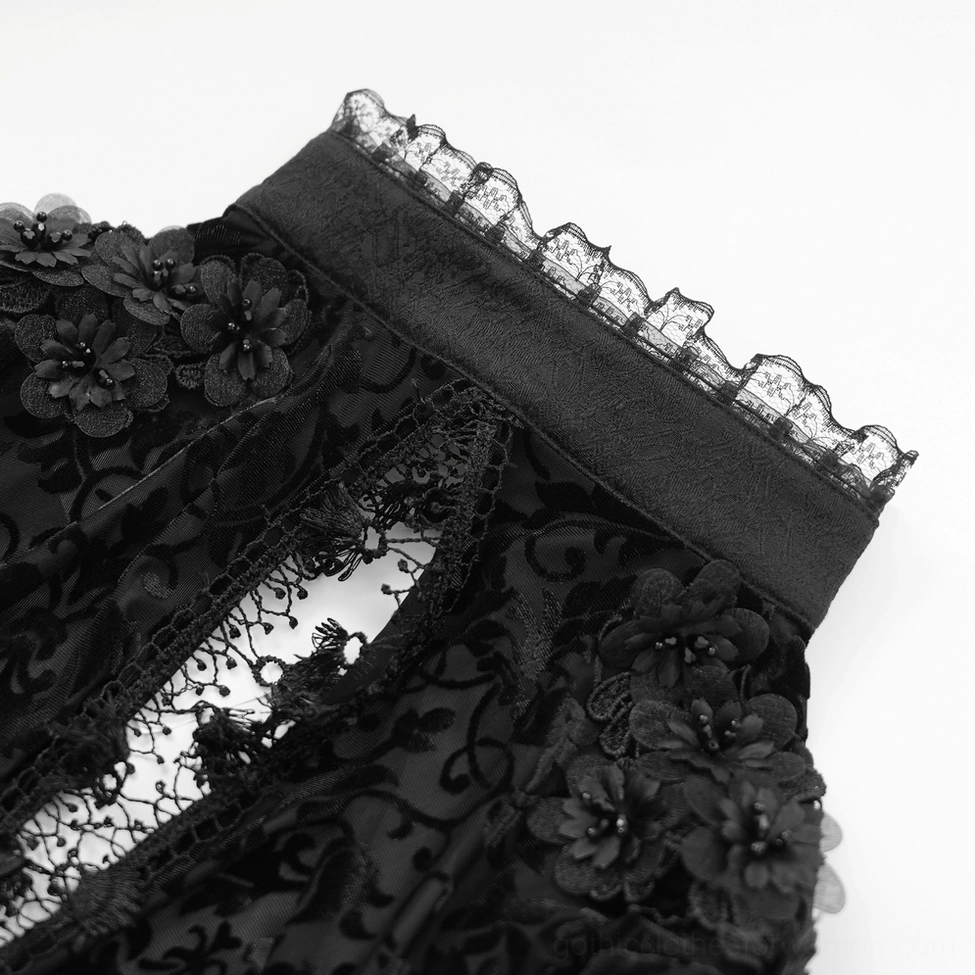Black lace bolero worn by gothic model showing how dramatic bell sleeves frame the body with theatrical elegance
