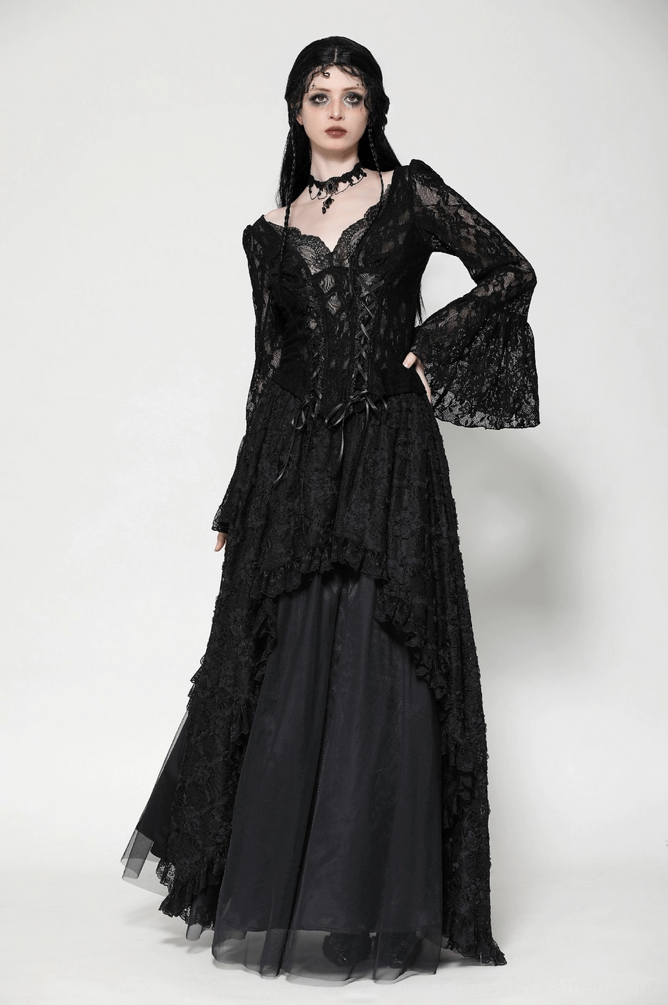 Detail shot of black lace corset top texture and fabric weave on Victorian-inspired gothic top