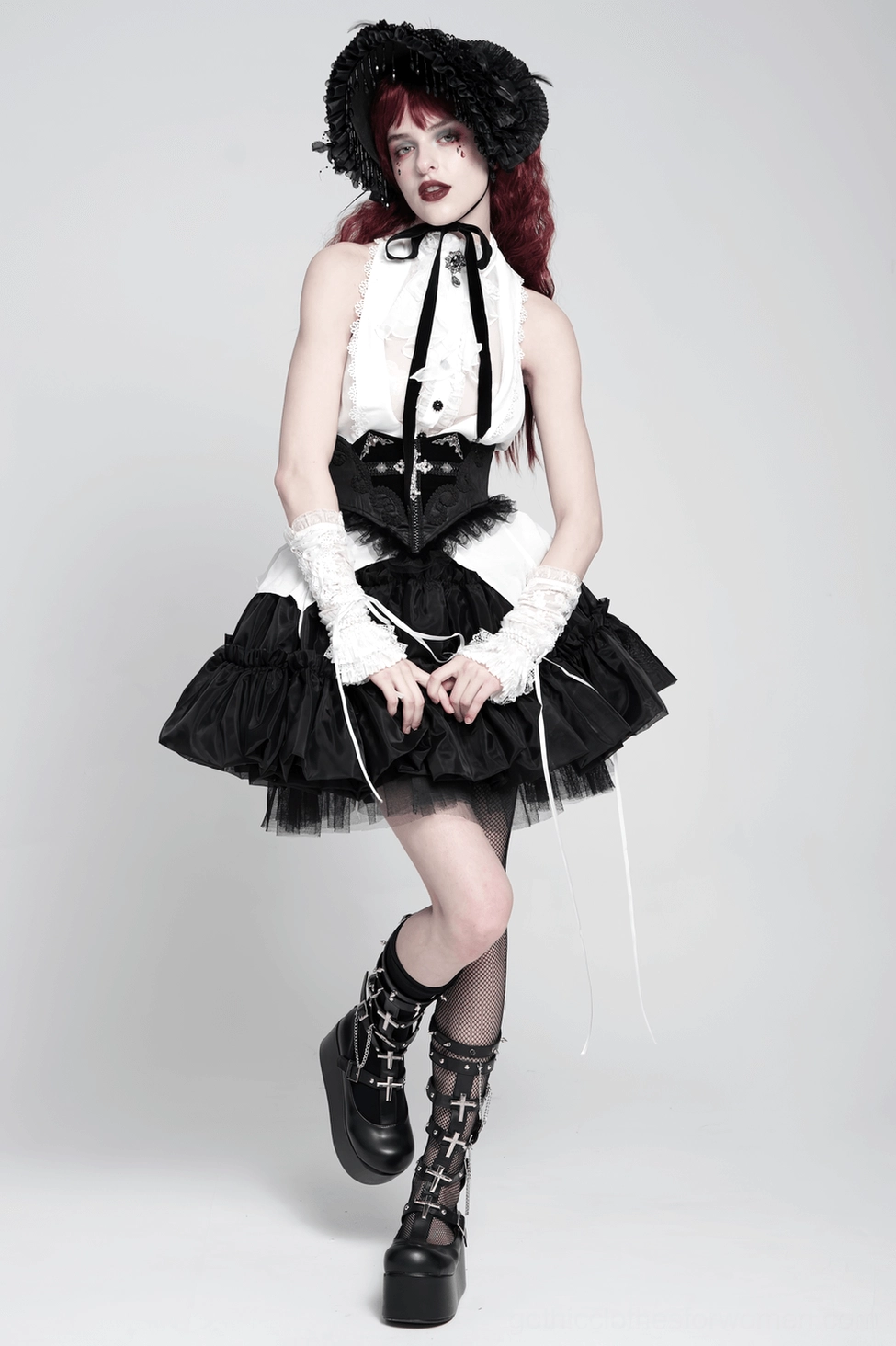 Black lace corset belt with silver cross embellishment studio product shot highlighting ornate design, tulle hem, and alternative fashion aesthetic