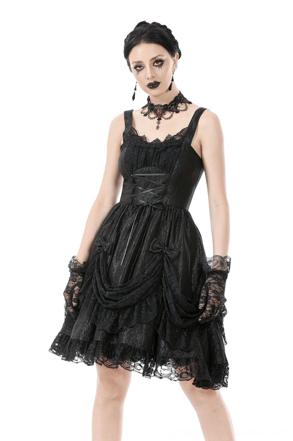 Black gothic lace slip dress with ruffled lace hem, front three-quarter view worn by model