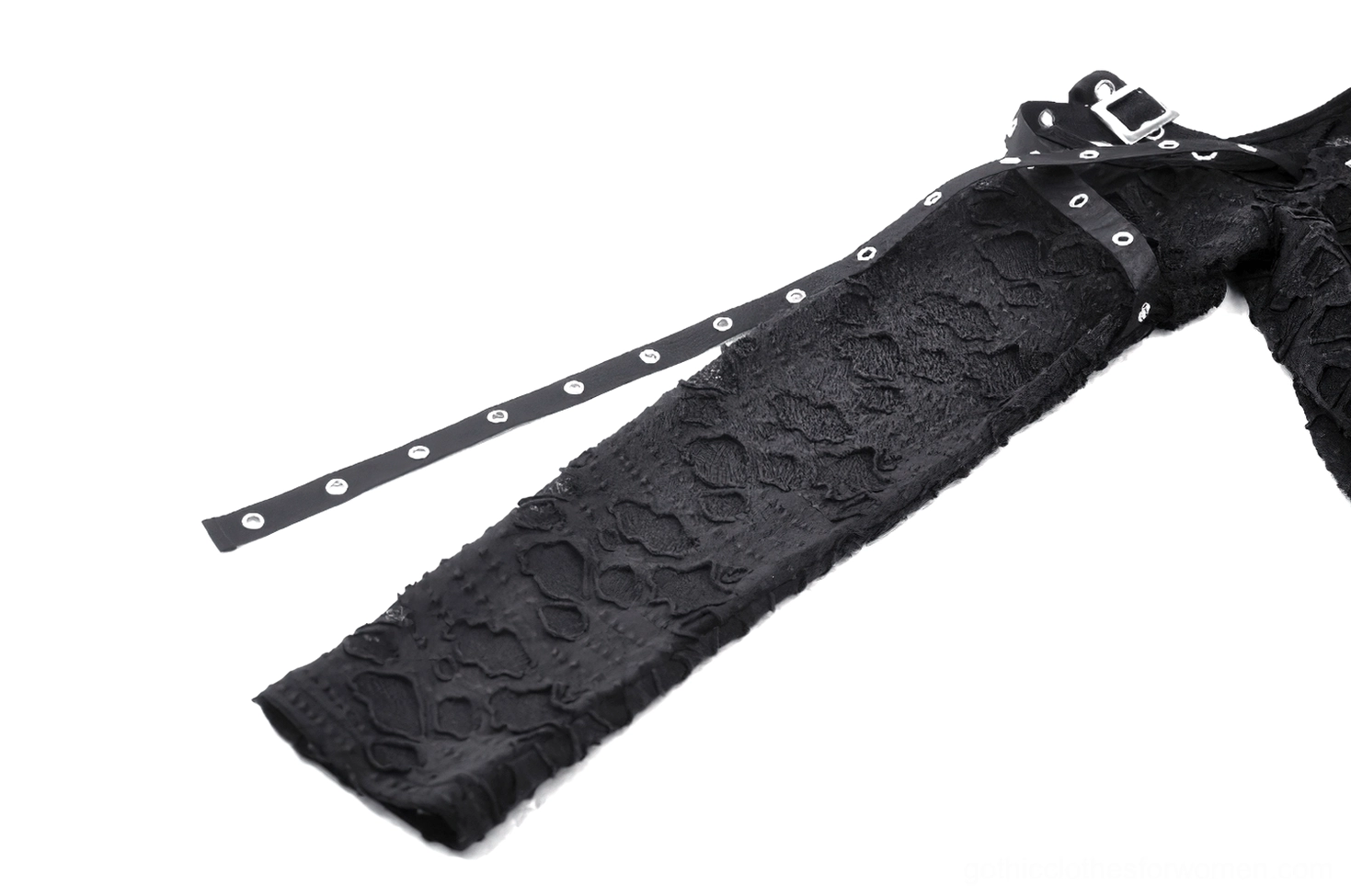 Extreme close-up macro detail of geometric hollow lace texture and distressed finish on black gothic mini dress fabric