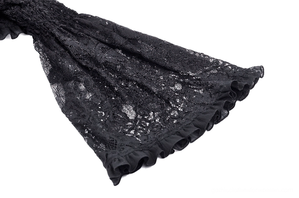Close-up of black lace bell sleeve with ruffled hem and all-over floral lace pattern