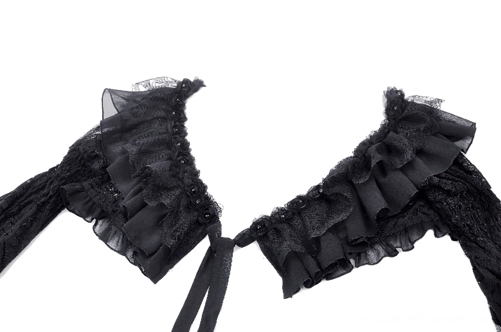 Close-up side view of black lace gothic cape showing layered ruffled collar and tie-back strap detail